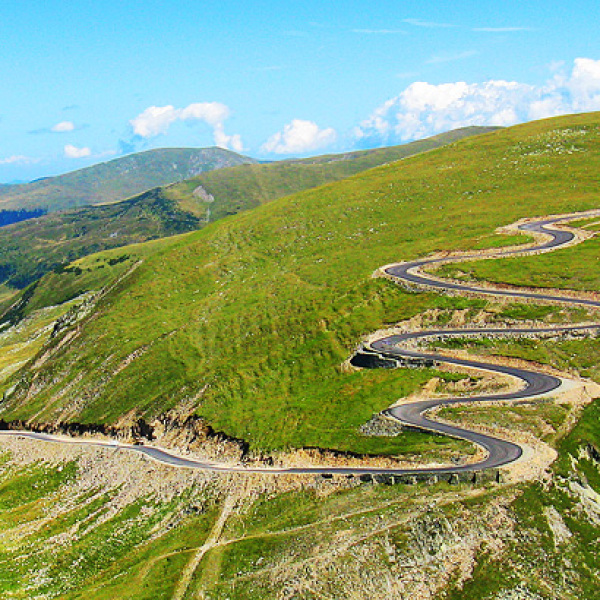 With the motorcycle through Europe - Adventures over mountains and along coastal roads.